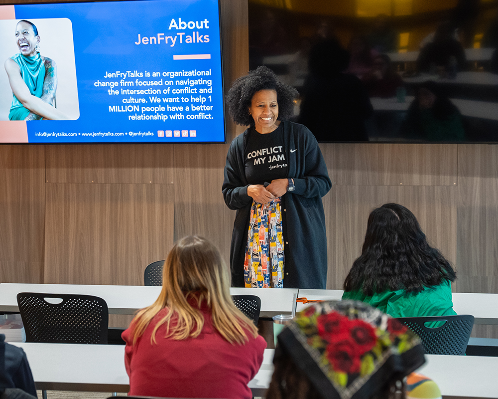 Dr. Jen Fry speaks with class