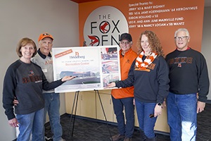 Alumni at Fieldhouse announcement