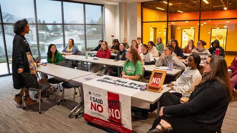 Dr. Jen Fry speaks with class